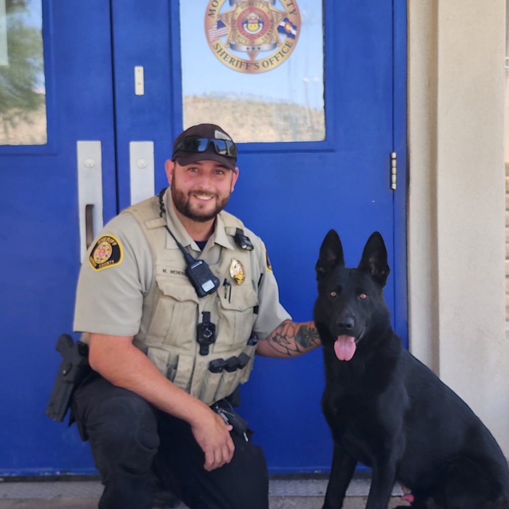 Deputy K9 Handler Mendisco and K9 Voodoo in front of the West End MCSO substation 